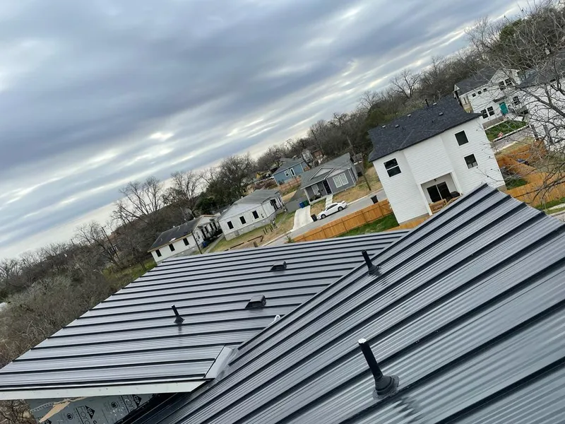 Standing seam metal roof panels with vents for Skylight Repair in Inkster